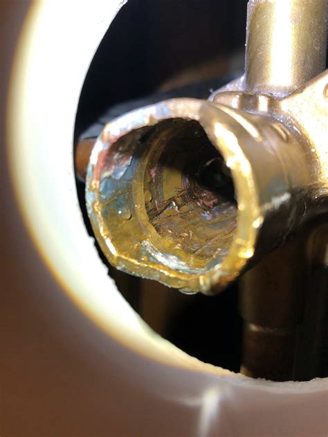 A professional plumber will charge his standard hourly rate or minimum fee. Gash in Brass Cartridge Fitting : Plumbing