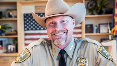 Sheriff From Live Pd Raffling Cowboy Hat For Greene County Deputy