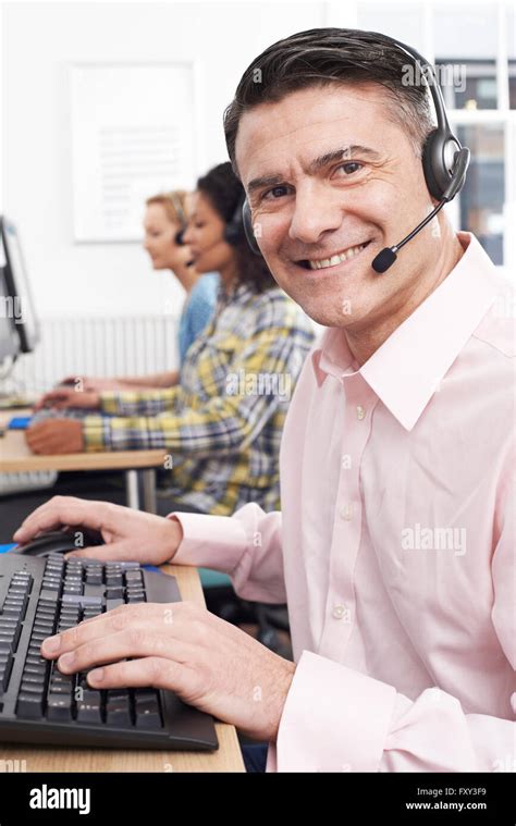 Male Customer Services Agent In Call Centre Stock Photo Alamy