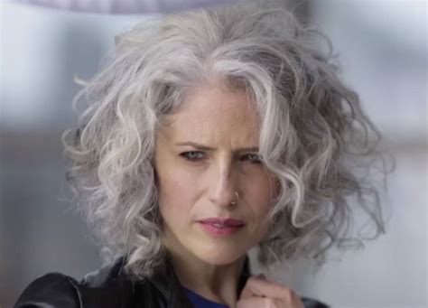 silver medium length shaggy bob with loose layered curls grey curly hair hair styles hairstyle