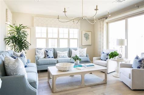Lovely Blue And White Living Room Features A Cfc Gimso Coffee Table