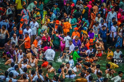 Image Of Indian Hindu Pilgrims Taking Holy Bath At Nasik Maha Kumbh