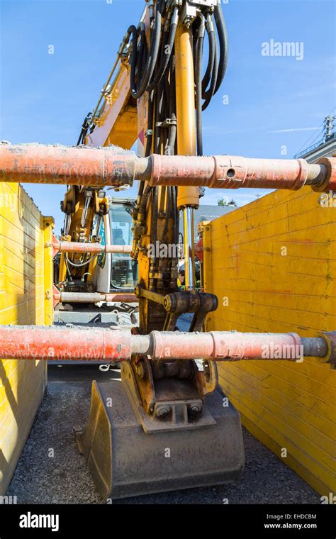 Excavator Parked On A Construction Site Stock Photo Alamy