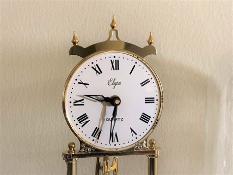 Vintage Elgin Quartz Japan Anniversary Clock Glass Dome Gold Finish Rotating Pendulum 115 T