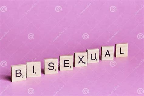 bisexual words represented by wooden letter tiles isolated on colour background with copy space