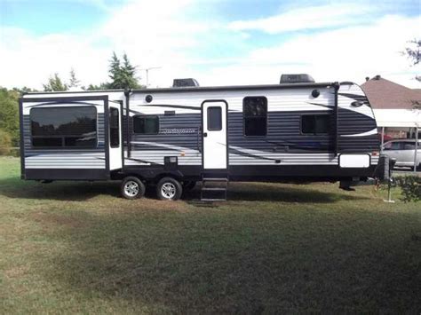 Get Ready To Hit The Road In This Beautiful Ft Bumper Pull Camper Has Dual Slide Outs Rear
