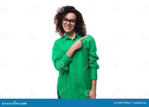 Confident Smart Young Business Woman Dressed In A Green Shirt Points