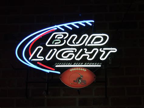 The Bud Light Neon Sign Is Lit Up For Us To See Whats Inside