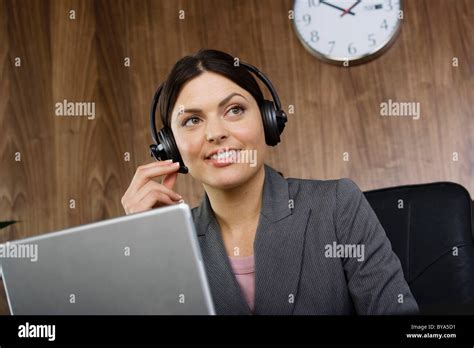 Business Woman On Telephone Headset Stock Photo Alamy