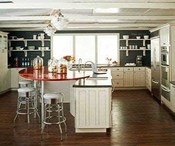 I do not know where it originated or who was the actual designer. Red, kidney shaped kitchen island with retro bar stools my ...