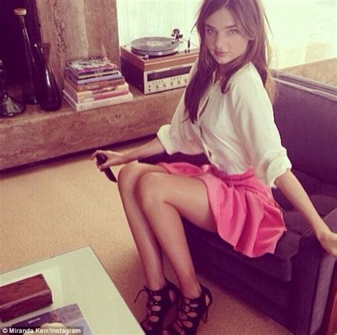 Miranda Kerr Is Flirty In A Bright Mini Skirt As New Face Of Handm Daily Mail Online