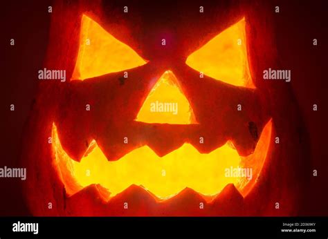 Halloween Pumpkin Face On A Black Background Stock Photo Alamy