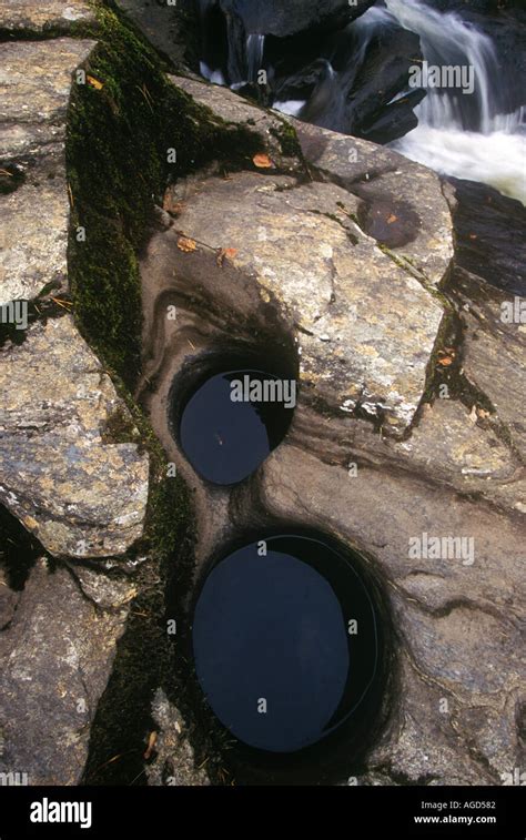 Two Holes Worn In Rock Hi Res Stock Photography And Images Alamy