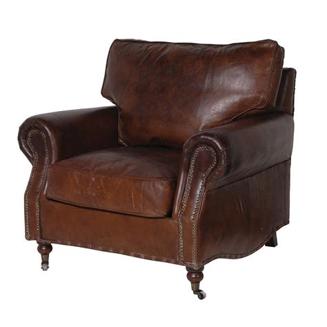 With luxurious arm rests and a supportive high back. Vintage Brown Leather Armchair Furniture - La Maison Chic ...