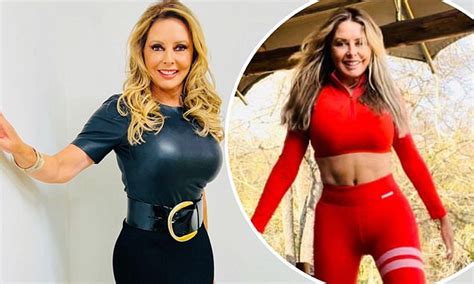 carol vorderman flaunts her svelte figure in a pleather top and flashes her abs in throwback snaps