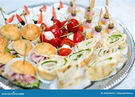 The Buffet At The Reception Assortment Of Canapes On A Table Banquet