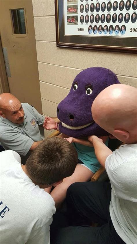 Firefighters Free Alabama Teen Who Got Stuck Inside A Giant Barney Head Abc News