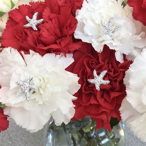 This handmade bouquet is perfect for those beach brides. Starfish Bouquet Picks-Silver Centerpieces-Boutonnieres ...