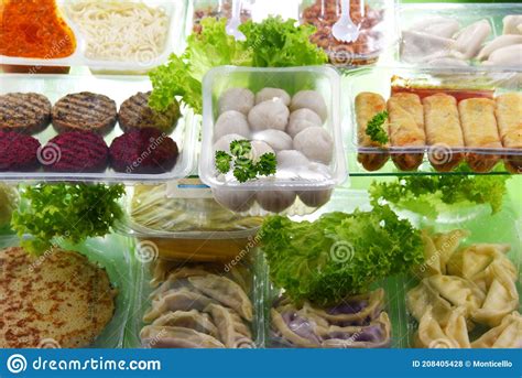 A Variety Of Prepackaged Food Products In Plastic Boxes Stock Photo