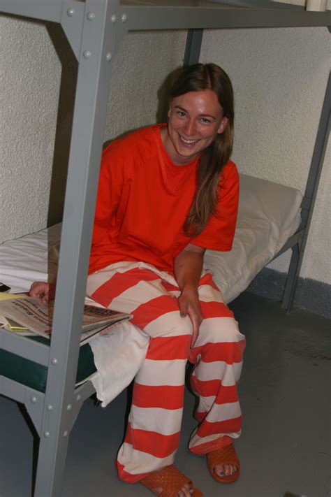 prison jumpsuit prison outfit orange jumpsuit handcuff got books inmates mug shots what