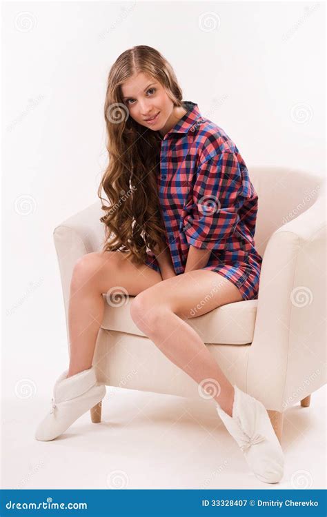 attractive woman sitting on a armchair stock image image of figure portrait 33328407