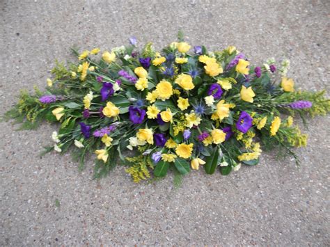 Double Ended Casket Spray Yellow And Blue Funeral Flowers Casket Flowers Funeral Floral