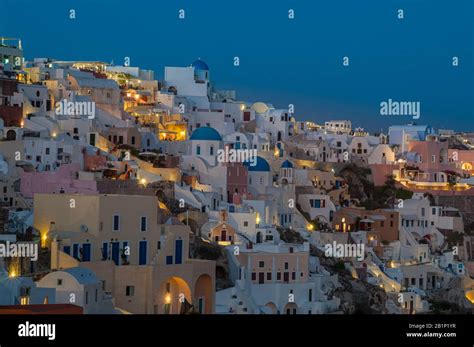 Santorini Twilight Sunset At Oia In The Cyclades Islands Greece Stock