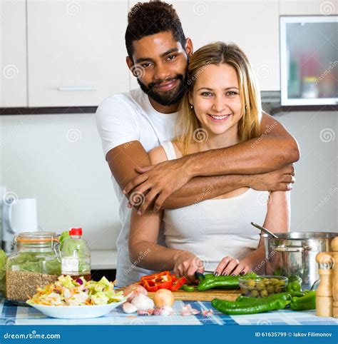 husband helping wife preparing healthy dinner stock image image of assistance leisure 61635799