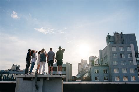 People Standing On Top Of Building · Free Stock Photo