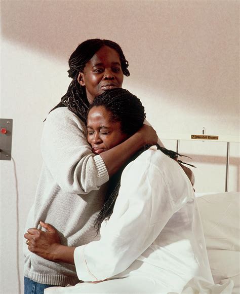 Pregnant Woman Being Comforted During Early Labour Photograph By Ruth