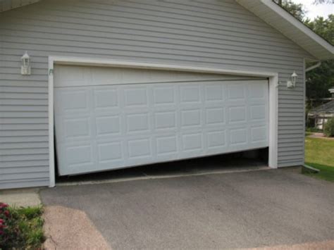 Signs Your Garage Door Springs Are Broken Baldwin Garage Doors And Gates