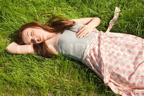 Beautiful Girl Lying On Grass Und Spaß Stock Bild Colourbox