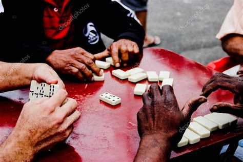 Men Playing Dominoes Stock Photo By ©josianepontel 13240753
