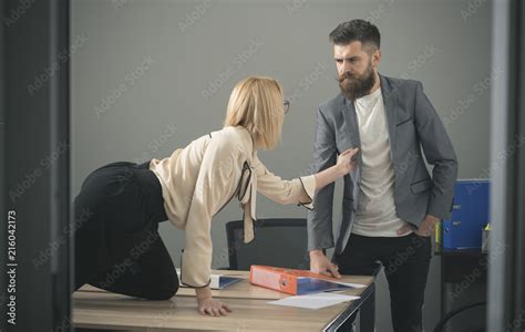 Sexy Secretary Flirting With Boss In Workplace Sexual Harassment And Office Abuse Concept