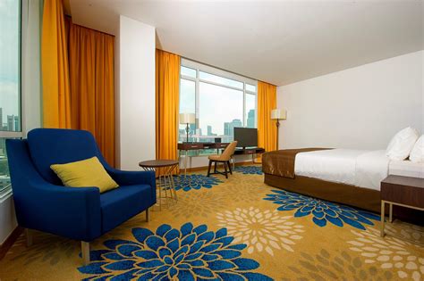 desain ruang tamu hotel motif populer