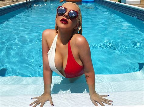 Christina Aguilera’s Patriotic Swimsuit Can Barely Contain Her Curves