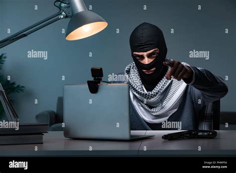 Hacker Wearing Balaclava Mask Hacking Computer Stock Photo Alamy