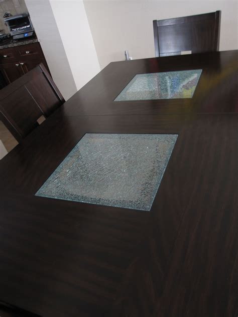 It also features a round top made of solid and stylish glass. dining table cracked glass accents | Dining table, Dining ...