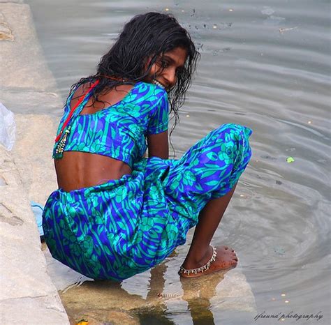 village women bathing and washing clothes udaipur india … flickr