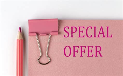 Special Offer Word On The Pink Paper With Pink Pencil Stock Photo