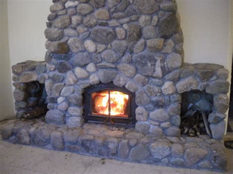 Glowing fireplace for the holidays. Proverbs 31 Living: A Natural Stone Fireplace