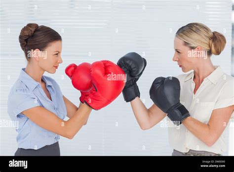 Businesswomen With Boxing Gloves Fighting Stock Photo Alamy