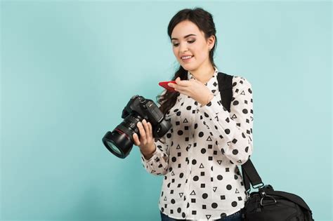 Premium Photo Young Woman With Camera And Its Case
