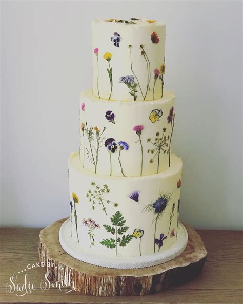 wedding cake decorated with edible wildflowers