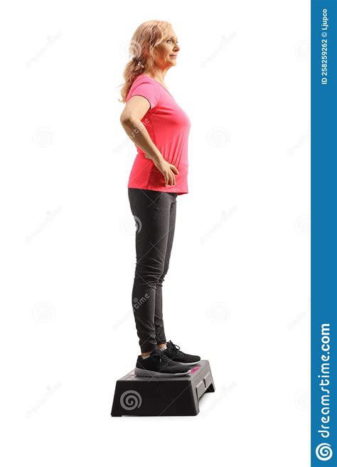 Full Length Profile Shot Of A Mature Woman Standing On An Aerobic