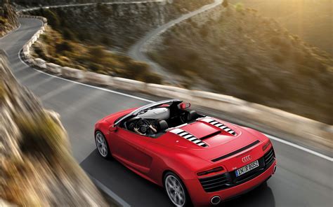 Red Audi R8 Running Fast On A Winding Road Never Compromise On Speed
