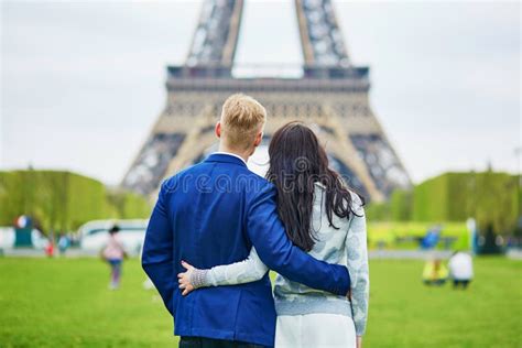 Romantic Couple In Paris Near The Eiffel Tower Stock Photo Image Of