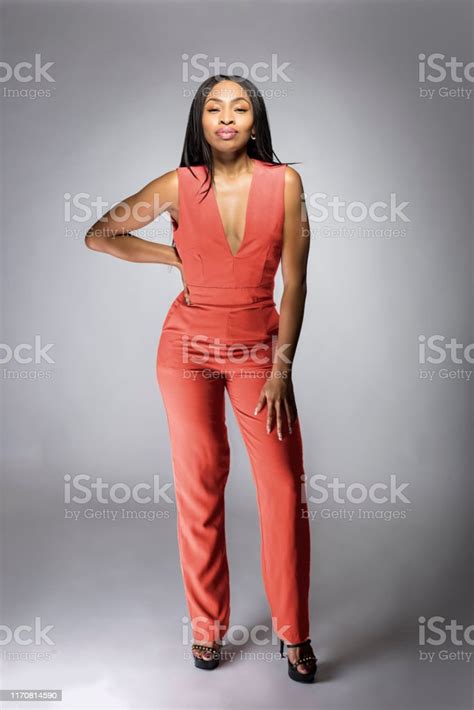 Black African American Fashion Model Wearing Pink Clothes Stock Photo