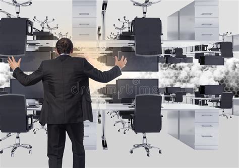 Businessman Standing In Inverted Office In Clouds With Flare Stock