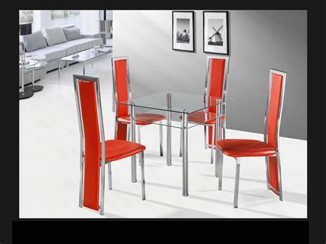 square clear  chrome glass dining table   red chairs